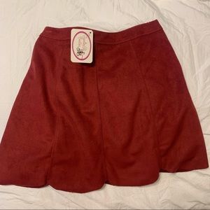 Faux suede garnet skirt w a scalloped hem size S